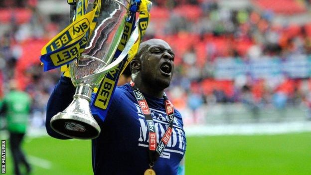 Ad o Akinfenwa: AFC Wimbledon icon released after play-off final win -  BBC Sport