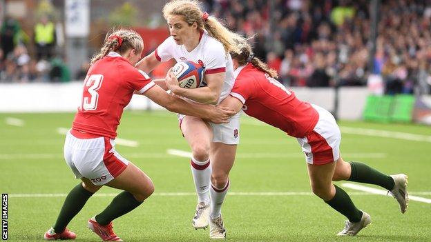 Abby Dow playing against Wales