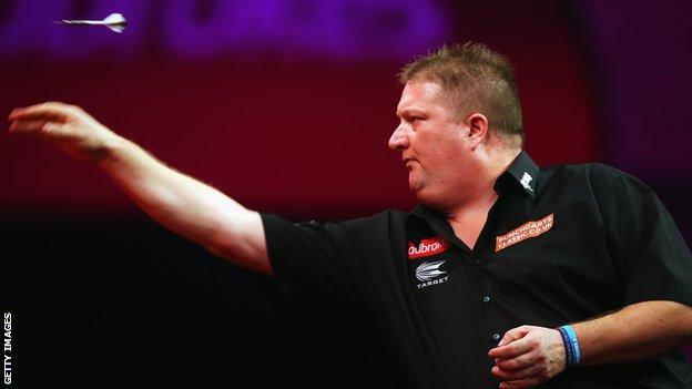 Colin Lloyd in action at the 2014 PDC World Championship