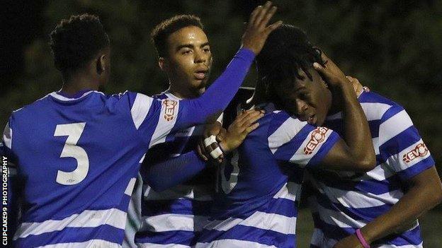 Dunstable Town players celebrate a goal