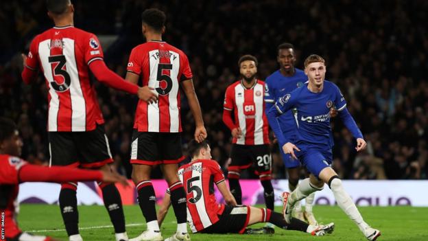 Cole Palmer wheels away after scoring for Chelsea against Sheffield United in the Premier League