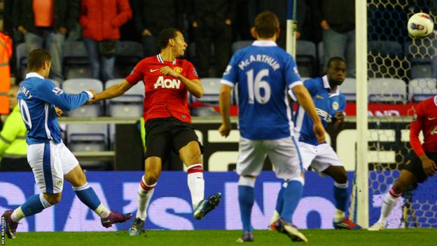 Shaun Maloney (left) hits Wigan's winner against Manchester United in 2012