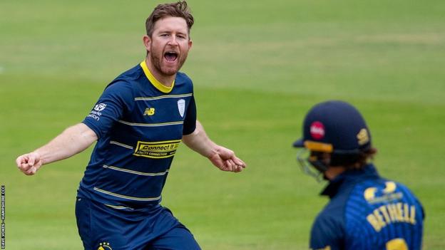 Liam Dawson celebrates a wicket for Hampshire