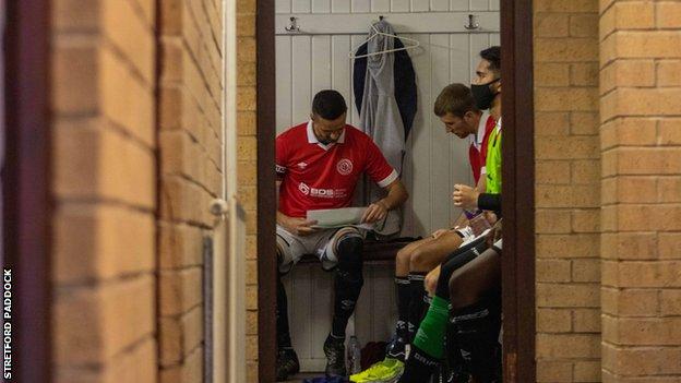 Stretford Paddock player in the changing room