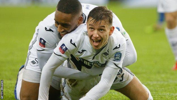 Bersant Celina celebrates with Leroy Fer