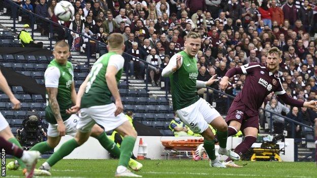 Stephen Kingsley celebrates curls in a terrific shot from a free-kick to make it 2-0 to Hearts