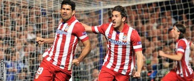 Diego Costa celebrates with team-mates