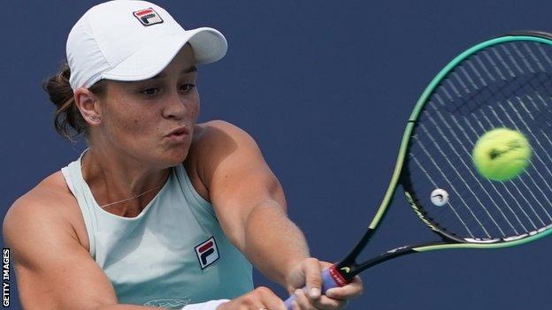 Ashleigh Barty returns in the Miami Open quarter-final against Aryna Sabalenka