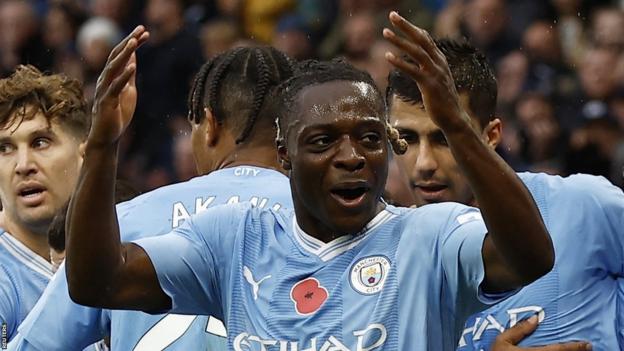 Manchester City's Jeremy Doku celebrates scoring the opening goal against Bournemouth in the Premier League