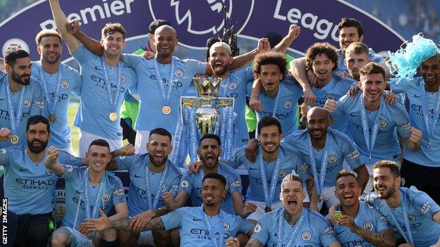 Manchester City celebrate winning the 2018-19 title