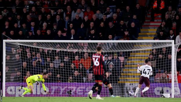 Phil Foden scores for Manchester City in their Premier League match against Bournemouth at Vitality Stadium