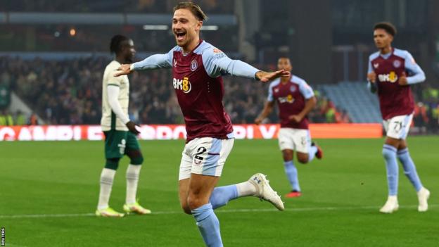 Matty Cash celebrates aft  scoring for Aston Villa