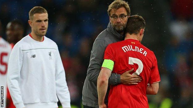 Jurgen Klopp, James Milner and Jordan Henderson