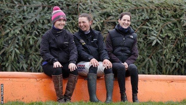 Katie Walsh, now retired as a jockey, shares a joke with Bryony Frost and Rachael Blackmore at Aintree