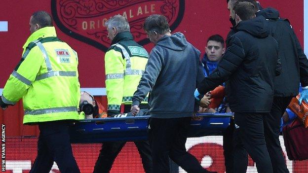 Martin Olsson was carried off on a stretcher at Brentford