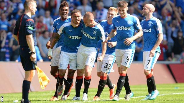 Rangers players celebrate at Ibrox
