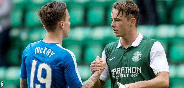 Rangers' Barrie McKay shakes hands with Scott Allan in a match against Hibs