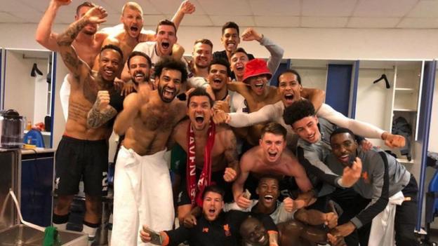 Liverpool's players celebrate in the dressing after reaching the Champions League final