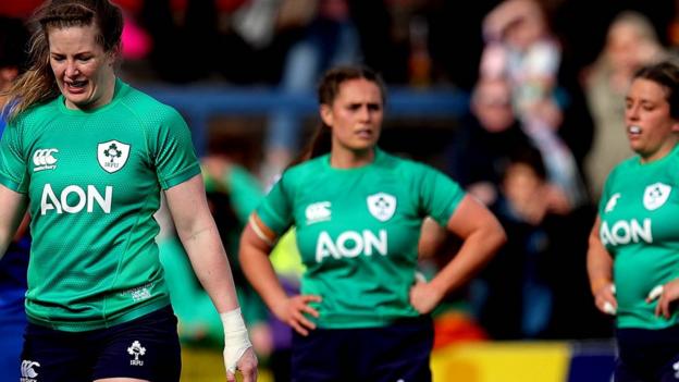 Ireland players look dejected after a heavy Six Nations defeat by France in Cork