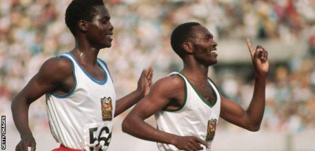 Kenya's Kip Keino (right) celebrates after winning the 1500 meters final at the 1968 Olympics in Mexico City