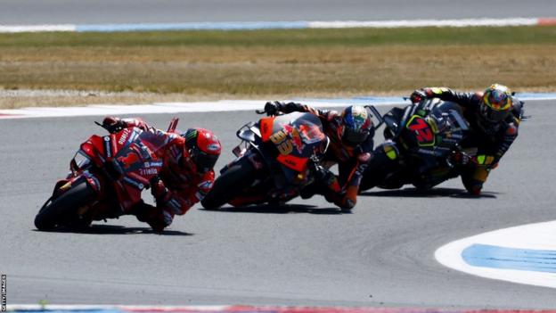 Italy's Francesco Bagnaia leads Brad Binder and Marco Bezzecchi at the Dutch Grand Prix