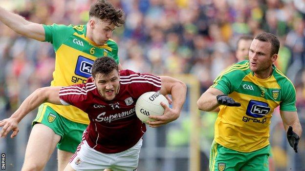 Donegal's Kevin Gillespie collides with Galway opponent Damien Comer in the Sligo qualifier