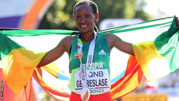 Ethiopia's Gotytom Gebreslase celebrates winning the women's marathon at the World Athletics Championships