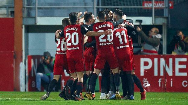 Mirandes players celebrate their 4-2 Copa del Rey victory over Villarreal