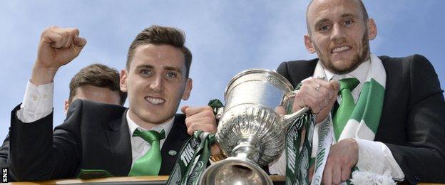 Hibs defender Paul Hanlon (left) and captain David Gray celebrate with the Scottish Cup