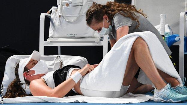 British number one Johanna Konta receives treatment on an abdominal injury at the Australian Open