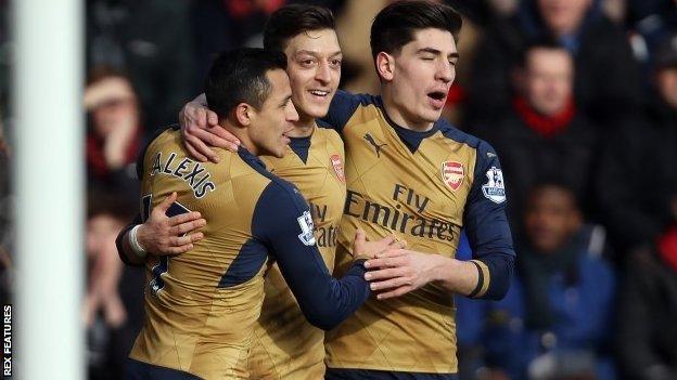 Arsenal celebrate scoring in an FA Cup tie