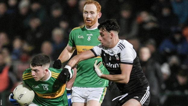 Glen's Conleth McGuckian is tackled by Kilcoo's Dylan Ward in last year's Ulster semi-final