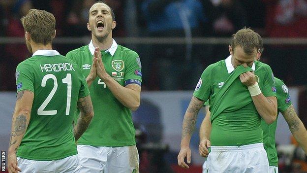 Republic of Ireland players after defeat by Poland