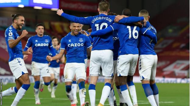 Everton players celebrate a goal