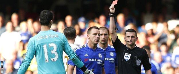 Thibaut Courtois is sent off for bringing down Bafetimbi Gomis