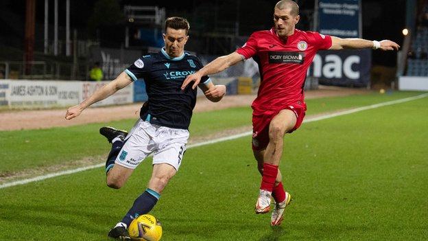 Dundee's Cammy Kerr (left) battles with St Mirren's Alex Gogic in a match that was competitive but rarely inspiring