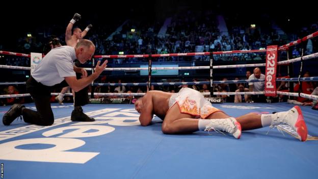 Joe Joyce on the floor after being dropped by Zhilei Zhang