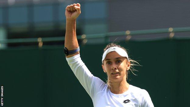 Lesia Tsurenko celebrates winning a point against Jodie Burrage at Wimbledon