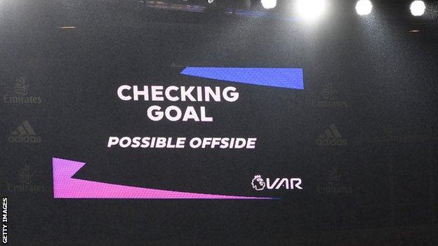 Checking offside