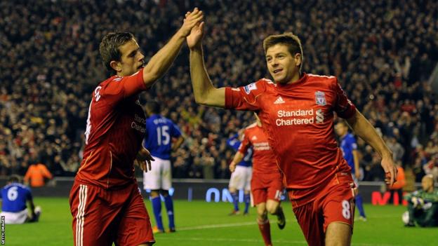 Steven Gerrard and Jordan Henderson celebrate a Liverpool goal against Everton