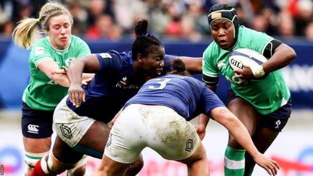 Linda Djougang attempts to get past France's Madoussou Fall and Assia Khalfaoui in Le Mans as skipper Edel McMahon is there in support as well