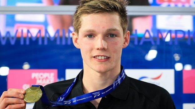 Duncan Scott with his men's 200m freestyle gold medal
