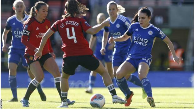 Maya Le Tissier takes on Leicester City players