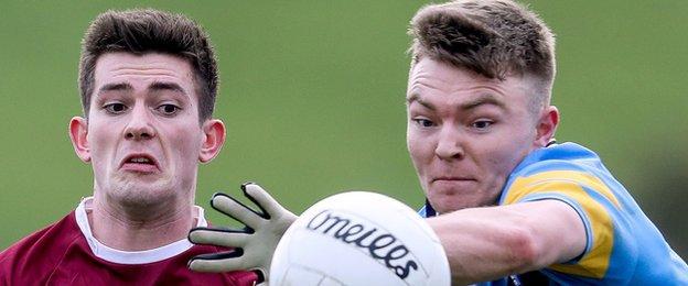 Colm Byrne of St Mary's competes against UCD’s Conor McCarthy