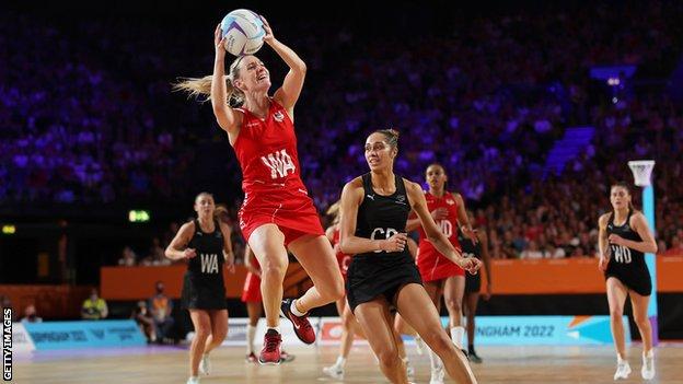 England's Natalie Metcalf jumps for the ball