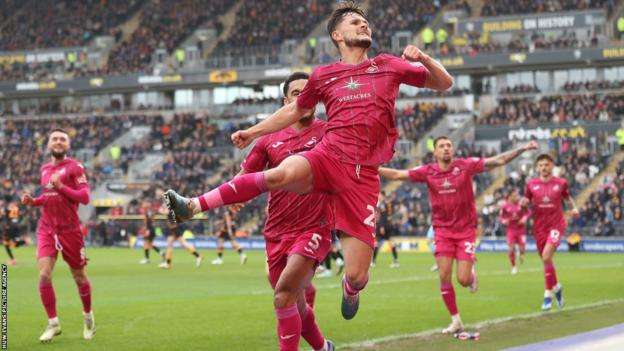Liam Cullen leads Swansea's celebrations after scoring his fifth goal of the season