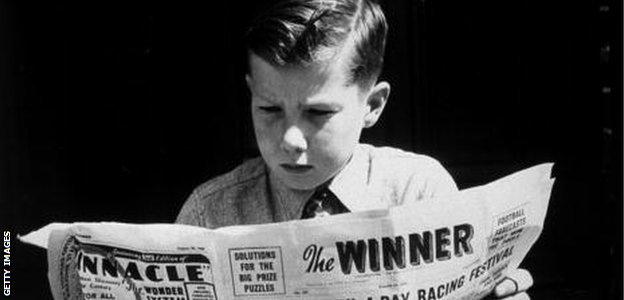 Lester Piggott, aged 12, studies the form in 1948