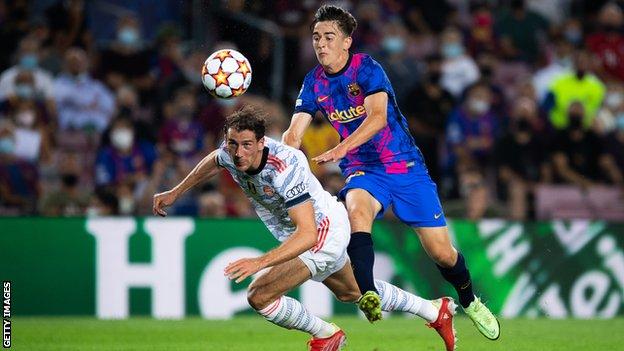 Gavi (right) competes for the ball with Leon Goretzka of Bayern Munich