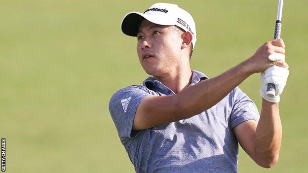 Collin Morikawa surveys an approach shot on Saturday