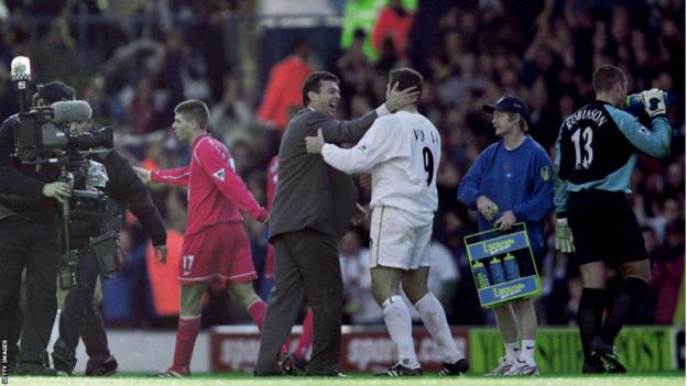 Mark Viduka with David O'Leary after scoring four goals against Liverpool